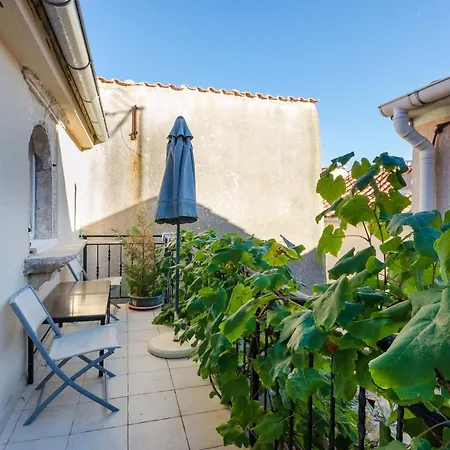 Apartment Under Ancient Roofs *