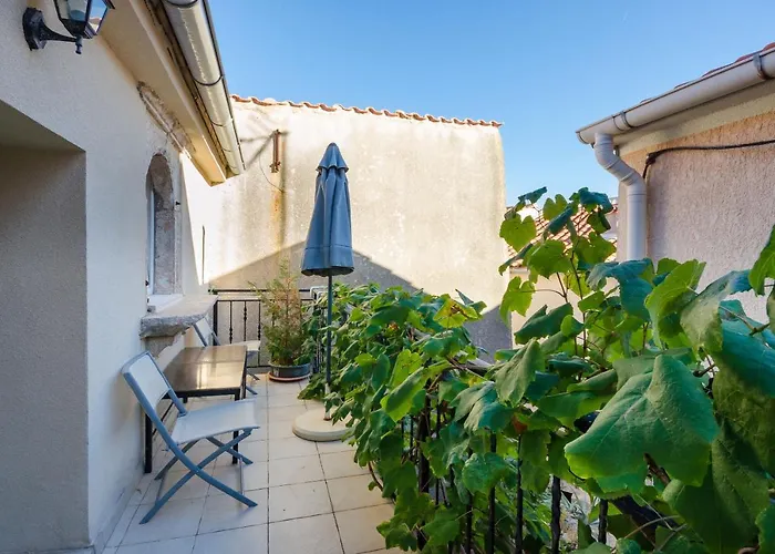Apartment Under Ancient Roofs *